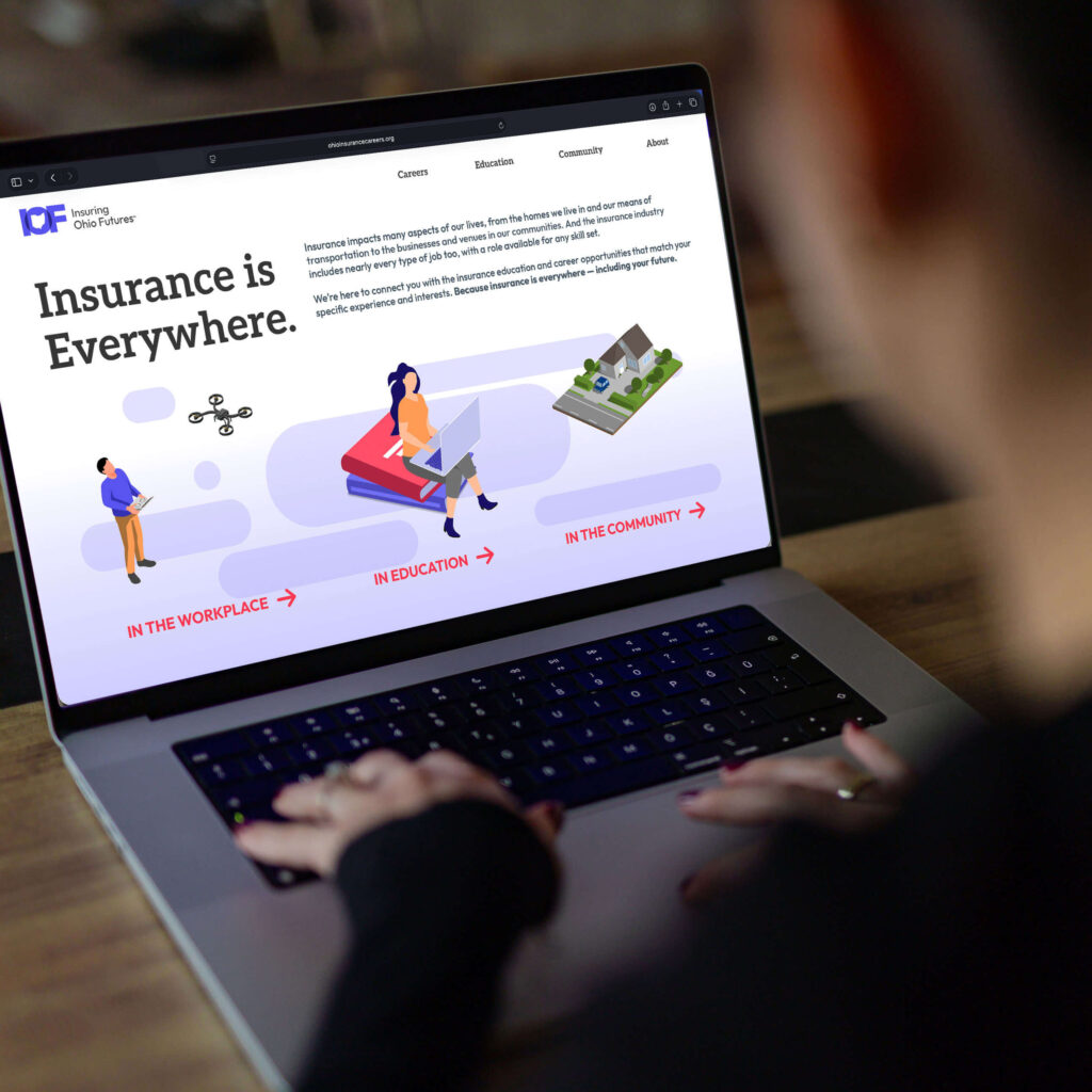 Laptop screen showing IOF website with