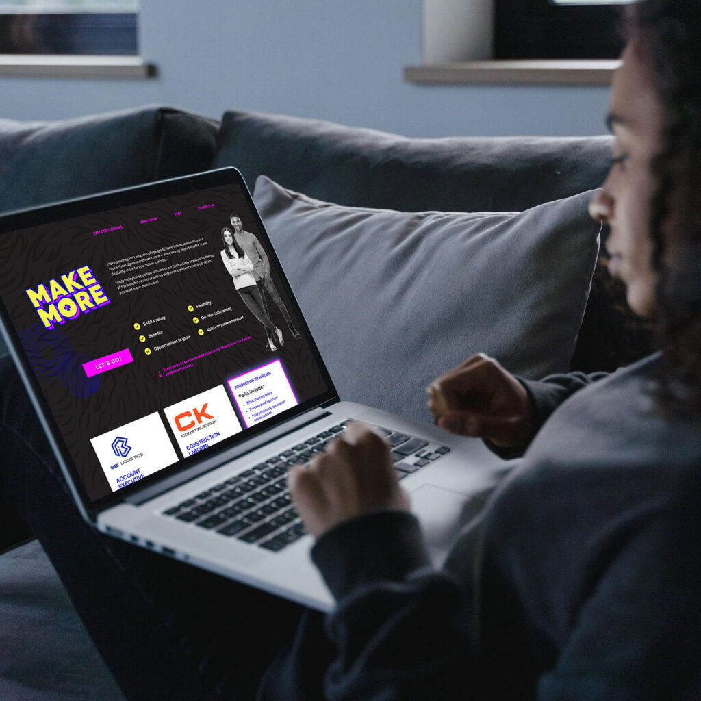 Person visiting the Make More website on their laptop